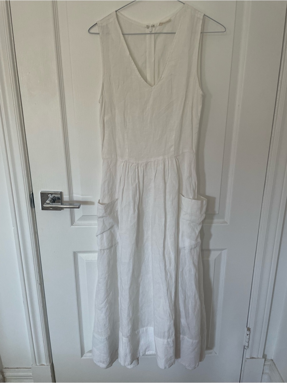 NAIF White Sleeveless V-Neck Linen Maxi Dress with Pockets